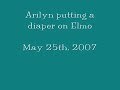 arilyn puts a baby diaper on elmo tmx