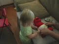 arilyn puts a baby diaper on elmo tmx