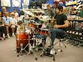 there was a drum off at guitar center last year and tommy just dropped in last minute and won.