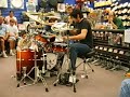 there was a drum off at guitar center last year and tommy just dropped in last minute and won.