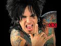 nikki-sixx-playing-with-condom.html