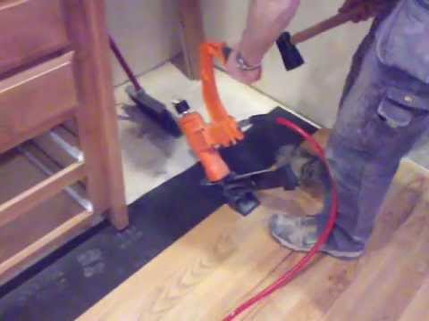 how to fasten a kitchen island to the floor