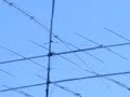 ham radio antennas in a guys yard