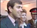 prince andrew and sarah ferguson before they married, larking about for the cameras. rather toughing to see them so loving and teasing each other.