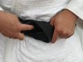 Tying the judo belt