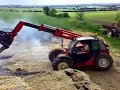 Clearing up straw with the Manitou Clearing up straw with the Manitou