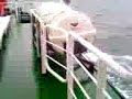 Angela getting soaked on the ferry to Gigha