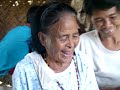 Masicampo Ruben C  Joya, the Titular Head of the Tagbanua tribe drinking \"tabad\" or rice wine