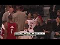 Ron Artest dives into the Miami Heat bench