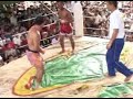 myanmar has a tradition of kickboxing that's said to date back to the bagan era, 
although the oldest written references are found in chronicles of warfare between 
myanmar and thailand during the 15th and 16th centuries. myanmar kickboxing 
(myanma let-hwei) is very similar in style to siamese kickboxing or muay thai. 

the martial art's status has raised perceptibly and nowadays occasional championship 
matches are also occasionally held at aung san stadium and thuwanna indoor stadium in yangon.
rules & regulations
anything goes in the ring. all surfaces of the body are considered fair targets 
and any part of the body except the head may be used to strike an opponent. 
common blows include high kicks to the neck, elbow thrusts to the face and head, 
knee hooks to the ribs and low crescent kicks to the calf. a contestant may even grasp 
an opponent's head between his hands and pull it down to meet an upward knee thrust. 
punching is considered the weakest of all blows and kicking merely a way 
to 'soften up' one's opponent; knee and elbow strikes are decisive in most matches.

the structure and limitations of each match varies with its context 
and with the calibre of the participants. unlike thai boxing, which has borrowed 
a great deal from the queensbury rules in international or western boxing, 
myanmar boxing represents a more traditional form once shared by the two countries. 
rules tend to follow situational norms; fighters, managers 
and judges get together before each match and work out time limits and scoring criteria.

in the simplest rural matches, fought in a dirt circle, there's no time limit 
and a fighter loses once he has wiped blood from his face or body three times. 
in more organised amateur matches, boxers fight in square rings 
(5.8 by 5.5 metres), for three to five rounds of three minutes each, 
usually with two minutes rest between. professional matches in larger towns 
and cities begin with five rounds but may increase round by round to 12 rounds 
when the scoring is tight - even longer if no clear winner emerges earlier in

the match when such extensions occur, boxers can request a five-minute rest period 
for every seven rounds fought. at both amateur and pro matches, two referees 
officiate in the ring, where there's only one. at ringside are three judges 
who score the match by pooling their impressions of stamina, skill and bravery.

fighters bandage their hands but do not wear gloves; they fight barefoot 
except for nylon anklets worn to absorb perspiration. simple, 
dark-coloured shorts rather than baggy boxing trunks are usually worn; 
if the shorts worn by the contestants appear too similar in colour, 
the fighters may sew coloured bandanas over the front to make it easier 
for spectators to differentiate the opponents. 
in championship matches myanmar fighters wear big, gaudy trunks.

before the match begins each boxer performs a dance-like ritual 
in the ring to pay homage to buddha and to khun cho and khun tha, 
the nats whose domain includes myanmar kickboxing. 
the winner repeats the ritual at the end of the match. 
a small musical ensemble consisting of drums, hne, cymbals 
and bamboo clappers performs during the rituals and throughout the match; 
the volume and tempo of the music rise and fall along with events in the ring.

there are no weight divisions in myanmar boxing. instead boxers are ranked 
by skill into first, second, and third class. the best boxers are said 
to hail from the ayeyarwady division, mandalay division, kayin state 
and mon state. at present myanmar's most celebrated boxer is the national champion 
shwe du won from hpa-an, kayin state. 

myanmar's most famous myanma let-hwei teacher is saya pan thu, 
founder of the institute of myanmar traditional advanced boxing 
and one of three trainers at yangon university. he comes from a teaching lineage 
that emphasises myanmar's most traditional style of kickboxing, 
but also incorporates a few grappling and wrestling techniques 
from the judo-like myanmar art of bando. 
due largely to pan thu's steady promotion of myanmar martial arts, 
the country is on the verge of establishing the myanma traditional boxing federation, 
an organisation that will regulate boxing rules, 
introduce new safety measures to the ring and develop overall professionalism.