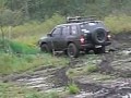 Nissan Pathfinder 4x4 in the mud as usual