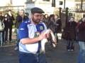 Watch man being slapped with a fish