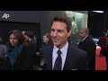 tom cruise premieres 'mission: impossible - ghost protocol' in new york with his wife katie holmes and talks about the film's dangerous stunts on the red carpet. (dec. 20)