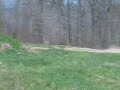 HPI Baja 5B jumping on motocross track