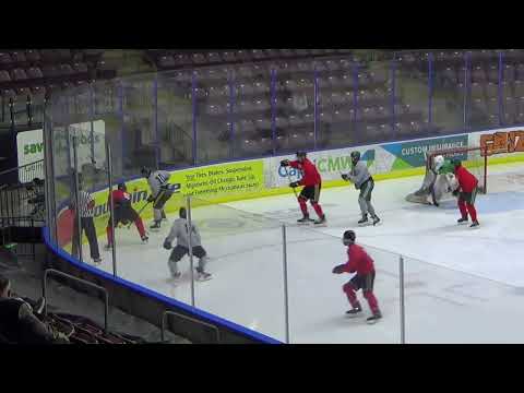 Liam (#15 Red) making an effective hit on an opposing player in grey. (Apr 30, 2022)