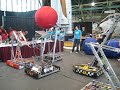 FIRST FRC Teams 48, 2399, 1270, 1532, and 1787 perform an impromptu Rube Goldberg demonstration at the 2008 NASA Glenn Research Center Open House.