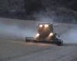 Cosechadora FENDT segando al anochecer