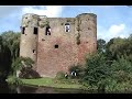 2 bagpipe players in old castle