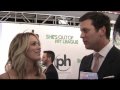 peter talks to jessica st. clair & hayes macarthur at the premiere of 