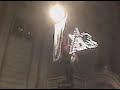 Guy trying to tear down a sign after Phils win the world series. Guy trying to tear down a sign after Phils win the world series.