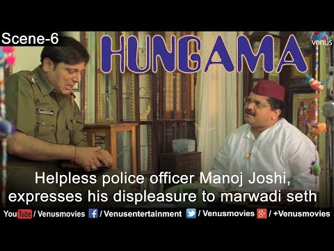 Helpless police officer Manoj Joshi expresses his displeasure to Marwadi.(Hungama)