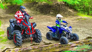 Den and Dad ride on Quad Bikes in the forest Famil