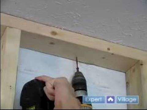 how to fasten tub to wall