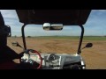 A paraglider caught in the act by two RZR-S