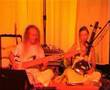 The Duo ASIAN STARS performes "Chakra Storm" by Catrin Cohnen and Teflon Fonfara at Cafe Nil. Instruments: Electric Sitar, E-Guitar, indian tanpura