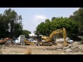 Click here to watch this video desenso de excavadora 320C CAT con rampa del remolque