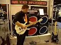 tommy is demonstrating electric babes(r) guitar