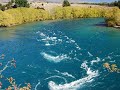 the clutha mata-au is the largest river in new zealand, and one of the swiftest in the world. from its source in the southern alps, it rushes 338kms through the central otago semi-desert to the pacific ocean. its clear turquoise waters are the result of glacial and snow-melt filtering by upland lakes. the remarkable speed and colour of the clutha mata-au place it among the rarest rivers in the world. large hydro-electric dams have destroyed some of the most spectacular sections of the river, first in 1956, and again in 1993. now, the dam builders are back, threatening to destroy what remains ... the song is titled 'damn the dam' and is sung by the song writer john hanlon.