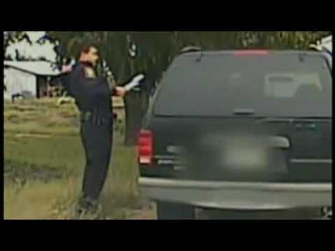 CAT COP - Cat Climbs Up Cop During Pull-Over - Black cat befriends US cop - Cat policeman
