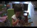 Emiko drinks from a cup 2008-09-07 Emiko drinks from a cup 2008-09-07