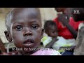 Click here to watch this video Mother and Child Flee Bombings in the Nuba Mountains