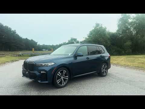 Used 2022 Phytonic Blue Metallic BMW xDrive40i image 1