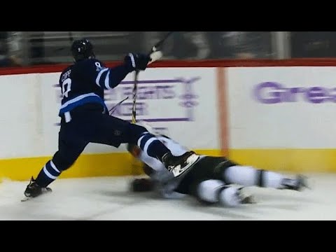 Video: Jets’ Armia, Wild’s Olofsson get rough treatment in Winnipeg