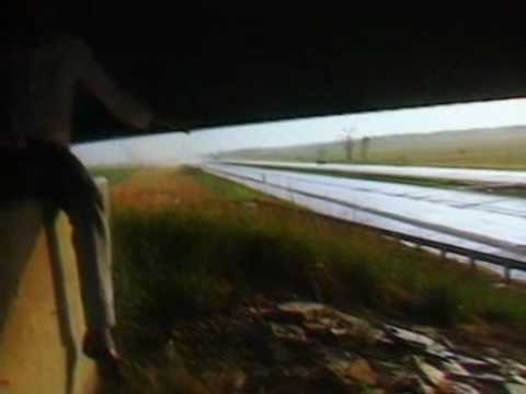 Overpass Tornado people running away from tornado. Overpass Tornado