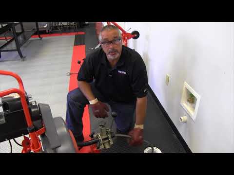 How to use the RIDGID K7500 drum machine power feed feature