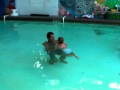 18 month old jumping and swimming to the steps.