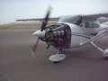 my fellow students and i doing a short ground run-up on an engine we overhauled at school, it sounds weird when i walk behind the prop, but that's just my camera.  upclose this thing sounds really nice i think.
