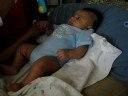 Mohsin trying to touch his toy