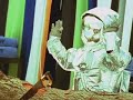 panic! at the disco are being interviewed, mtv's moonman drops by.