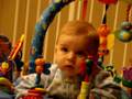 Caden in activity saucer at 6 & 1/2 Months Old