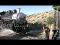 Years ago the Nevada Commission for the Reconstruction of the Virginia and Truckee Railway purchased a steam locomotive sight unseen, taking a bank loan for $500000. They bought McCloud River Railroad #18 for $420000 from the McCloud tourist line operator, Jeff Forbis. After decades of neglect, continuing abuse under a lease to Sierra Railroad, #18 is finally in the skilled hands of the Virginia and Truckee Railroad. The privately owned V&T Railroad of Virginia City, Nevada, was contracted by the government to repair #18 in time to lease it out at Fillmore, CA, for the movie Water for Elephants. On its return from Fillmore, after further repairs, #18 ran it's first revenue short run to Gold Hill on July 23, 2010. On July 24, 2010, I was in Virginia City, Nevada at the railroad shops to watch this historical steam locomotive prepped for service, rolled out on the mainline, and coupled for the first time to the restored Gold Hill and Silver City open-platform passenger coaches. The present certainly beats the past, watch this video and listen to the political history of this long-neglected locomotive, now restored to service.