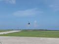 Saba Airport arrival of a Robinson R44 helicopter