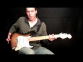 How to Hold A Guitar And Pick - Beginning Guitar Lesson