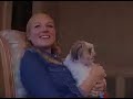 jewel talks about george - her little dog.  it's a short clip of relatively poor video quality.