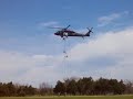 Repelling from a blackhawk helicopter