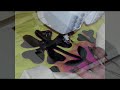 After fusing a Hawaiian style Machine applique block, I like to use the sewing machine to finish the edges or - edge stitch. It is very clever how I do it, because i quilt it at the same time!